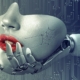 Robot hand holding a half a face of a robot woman with red lipstick